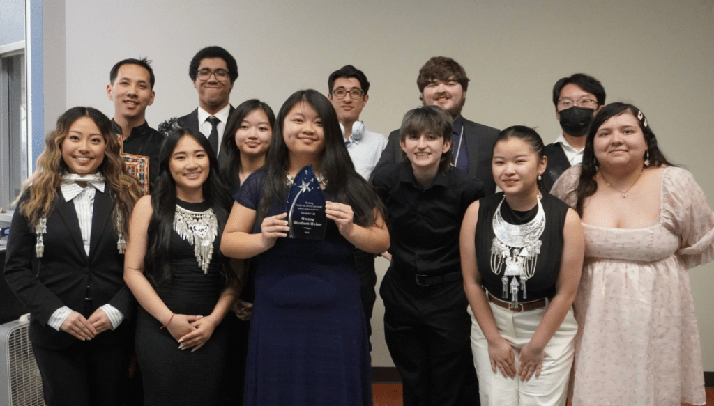 a group of people posing for a photo