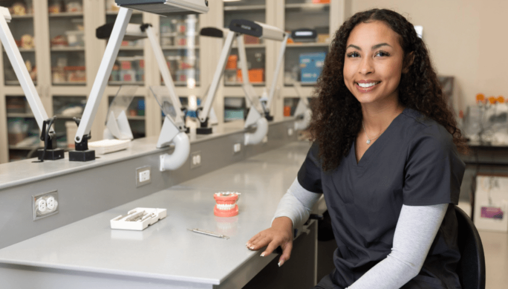 a woman sitting at a desk