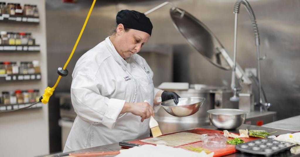 Student cooking in a lab