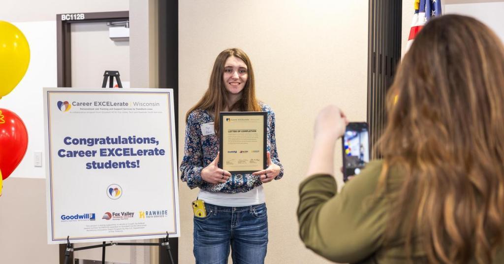 Student receiving a letter of completion