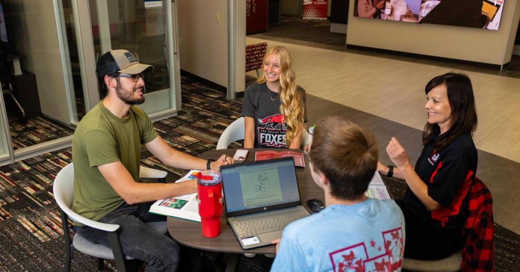 Students studying at table