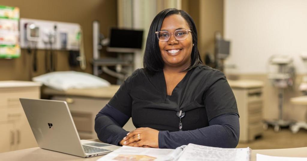 Student Spotlight Janay Curtis smiles in a medical lab.